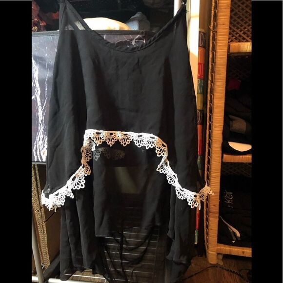 Black flutter multi layer sheer top with white embroidery trim. - Picture 1 of 7